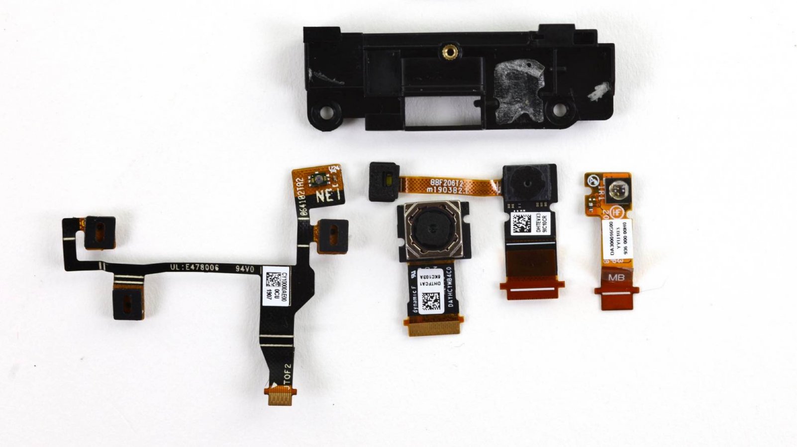 The Elite X2's camera module, with individual camera lenses and IR sensors removed.