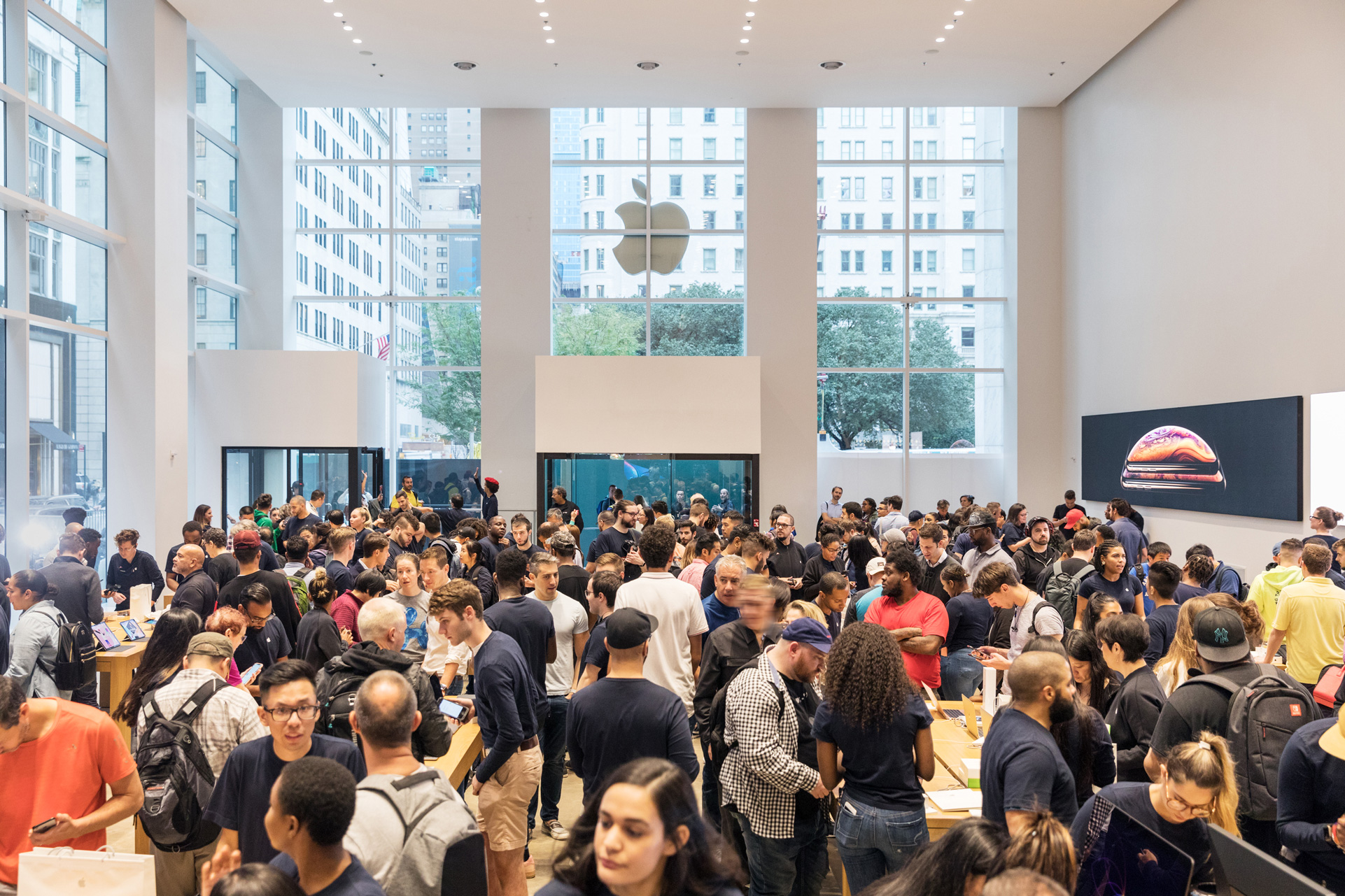 A busy Apple store on iPhone launch day.