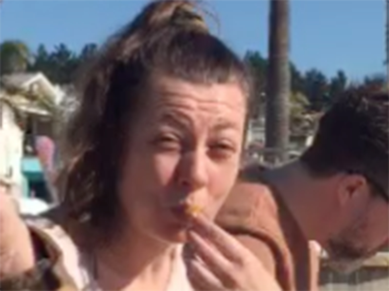 Sandra eating something sour