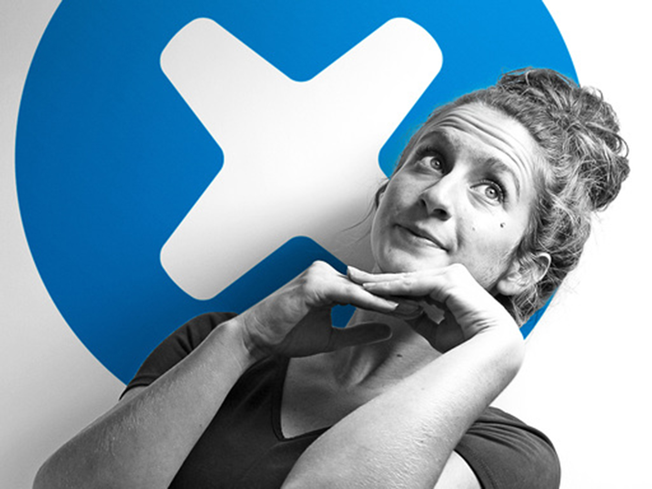 Marina posing in front of the iFixit logo