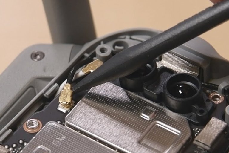 Spudger pulling loose a flat-top connector