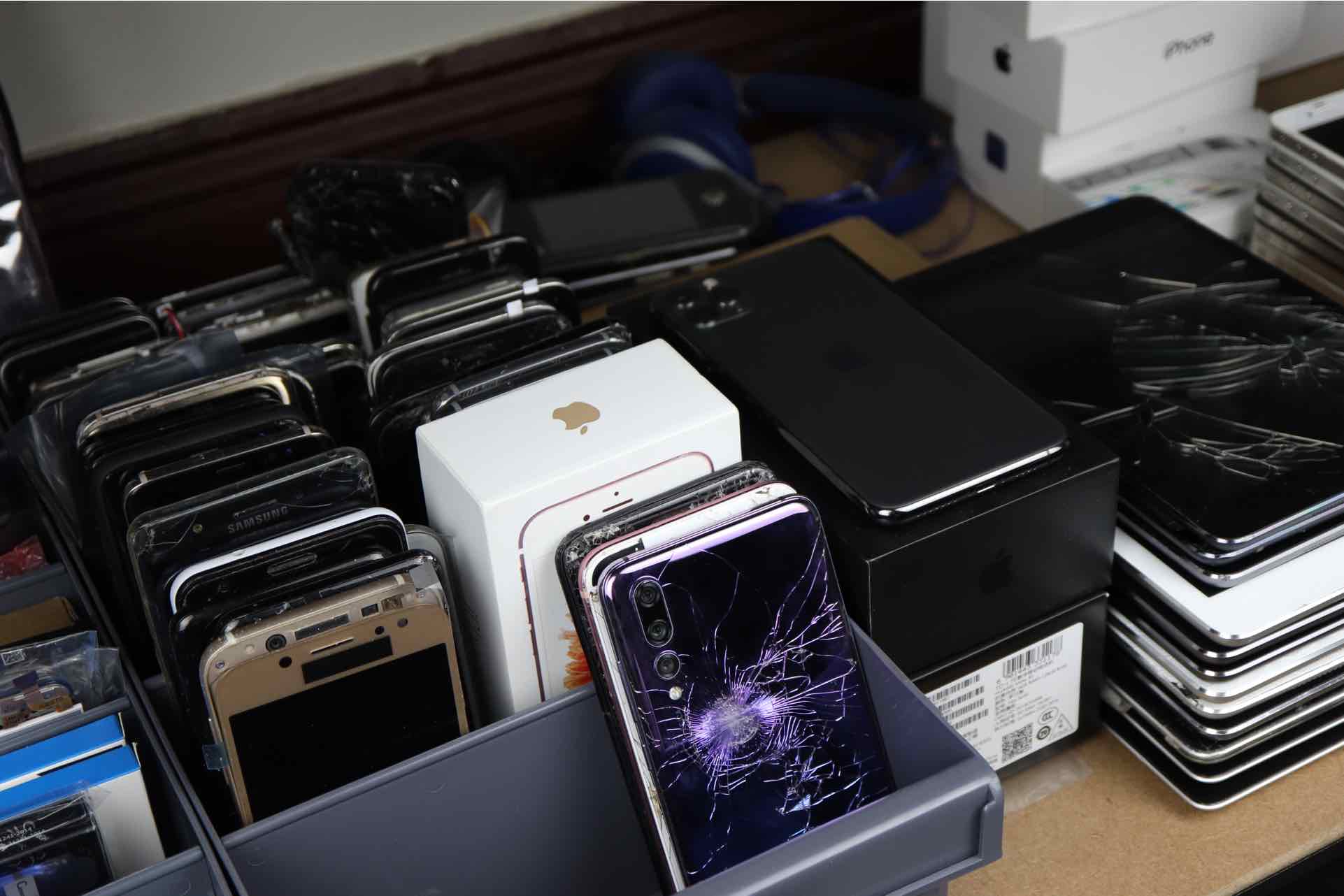 Collection of devices awaiting repair at Hugh Jeffreys' shop.