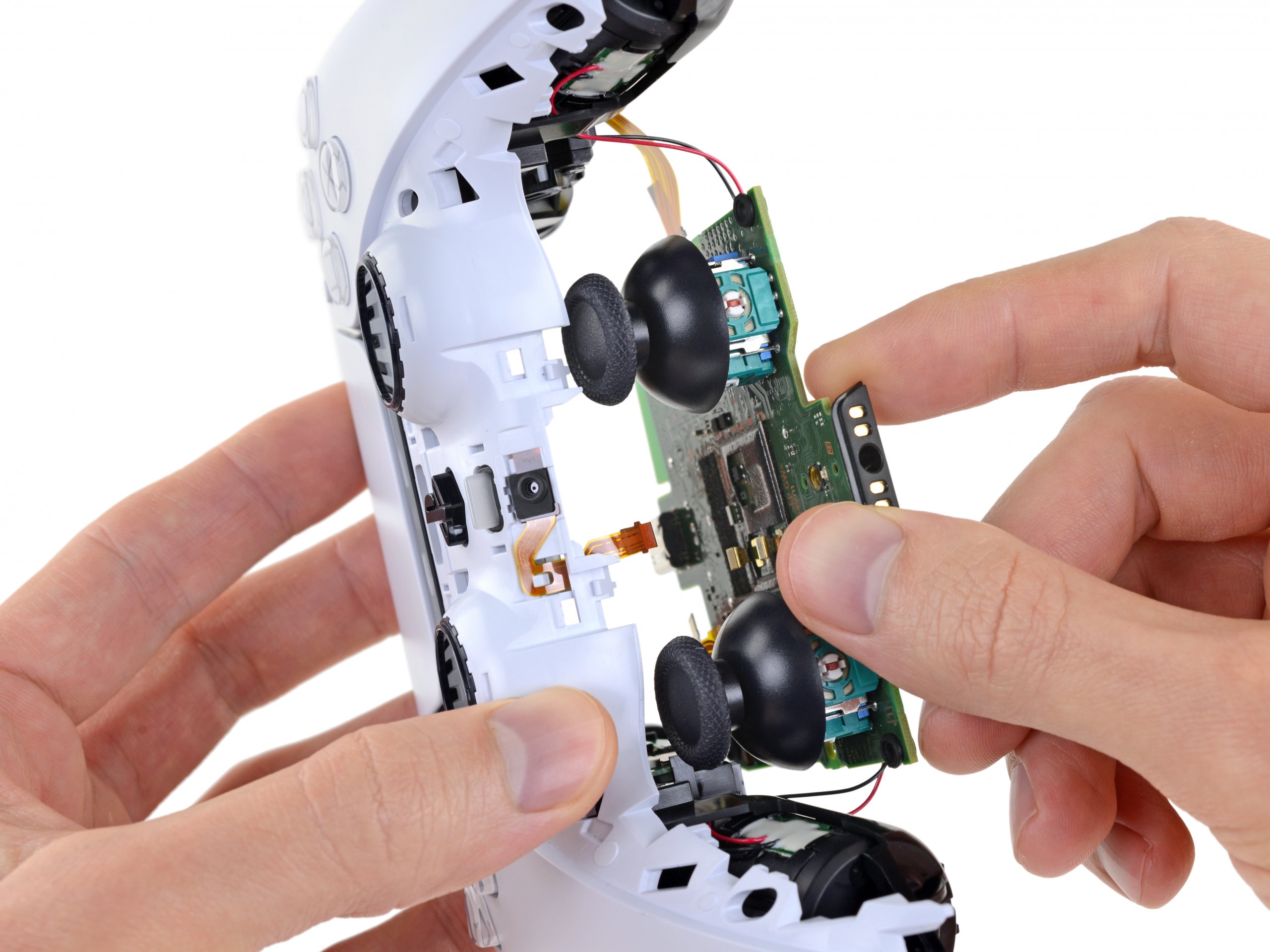 Opening a PS5 controller and removing main board.