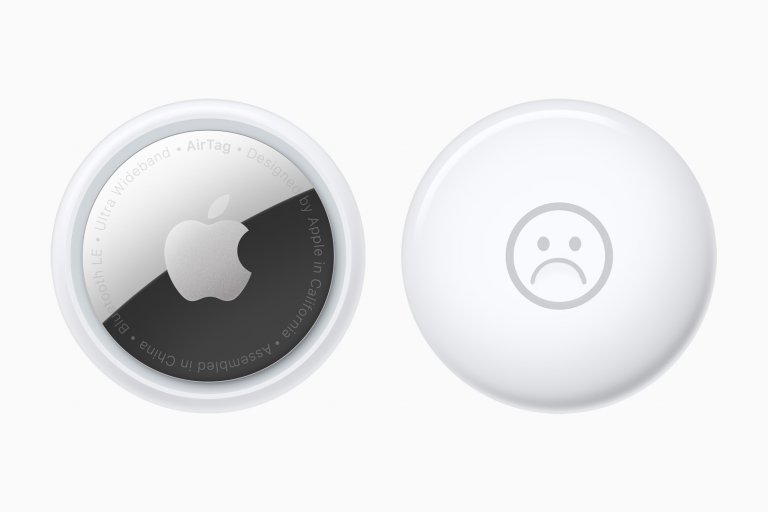 AirTag with a sad face emoji.