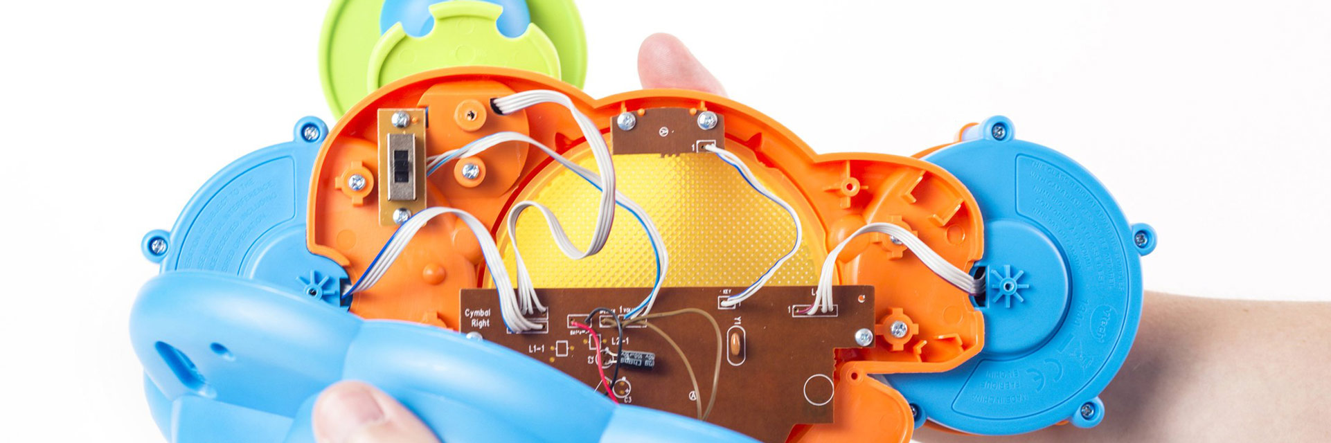 Vtech Kidibeats Drum Set gets a volume control replacement opening the case and showing the internal board and cables