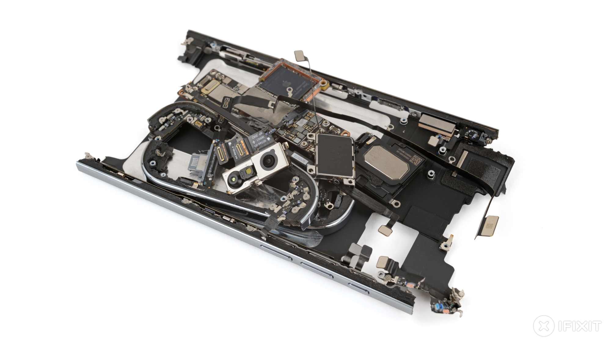 Many of the components of the iPhone Air piled into the broken frame