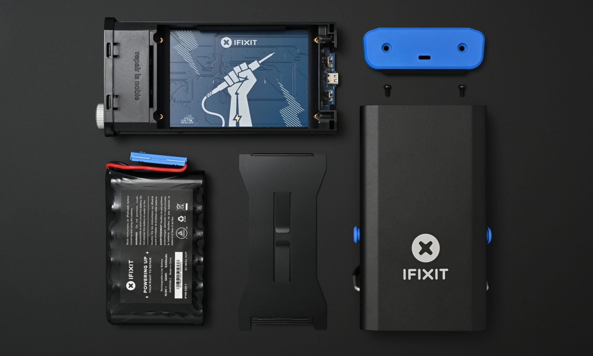 FixHub Portable Soldering Station disassembled on the table