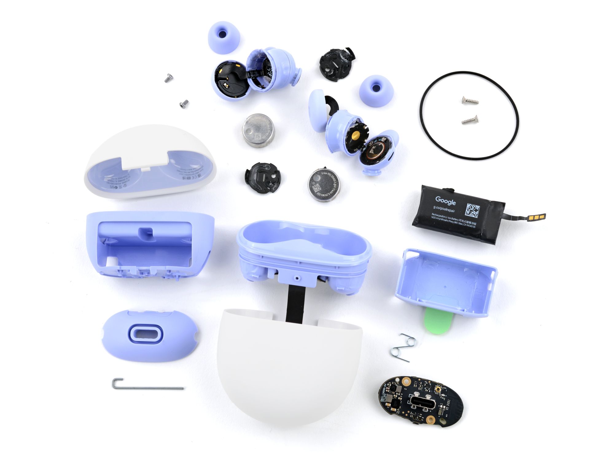 Pixel Buds 2a and case laid out on the table